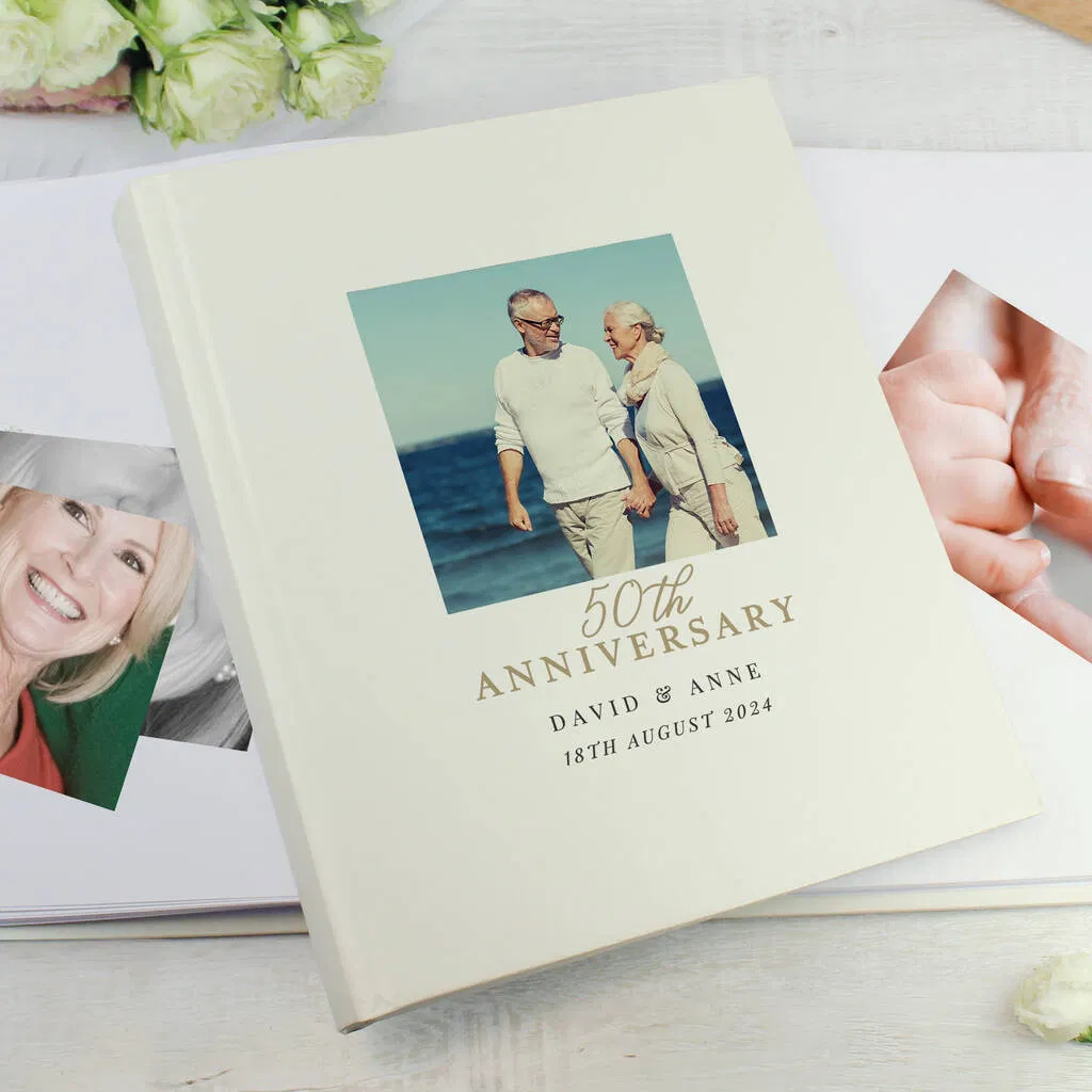 Personalised 50th Anniversary Picture Album with custom photo on the cover, showing fixed text '50th ANNIVERSARY' and personalised names and date.